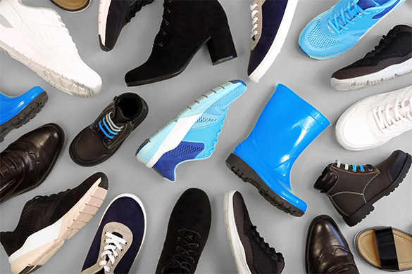 various types of footwear in a pile