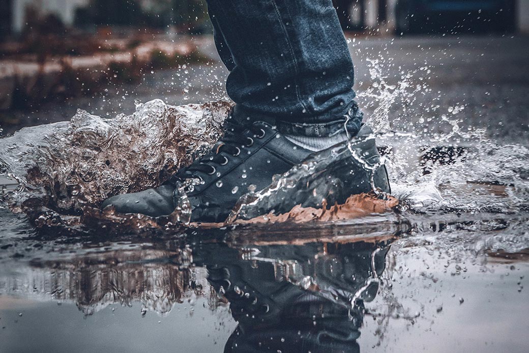 walking in muddy puddle